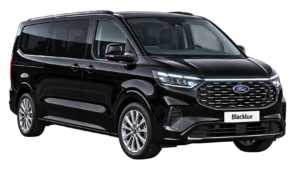 Black Ford Tourneo Custom shown from the front three-quarter view with a Blacklux plate